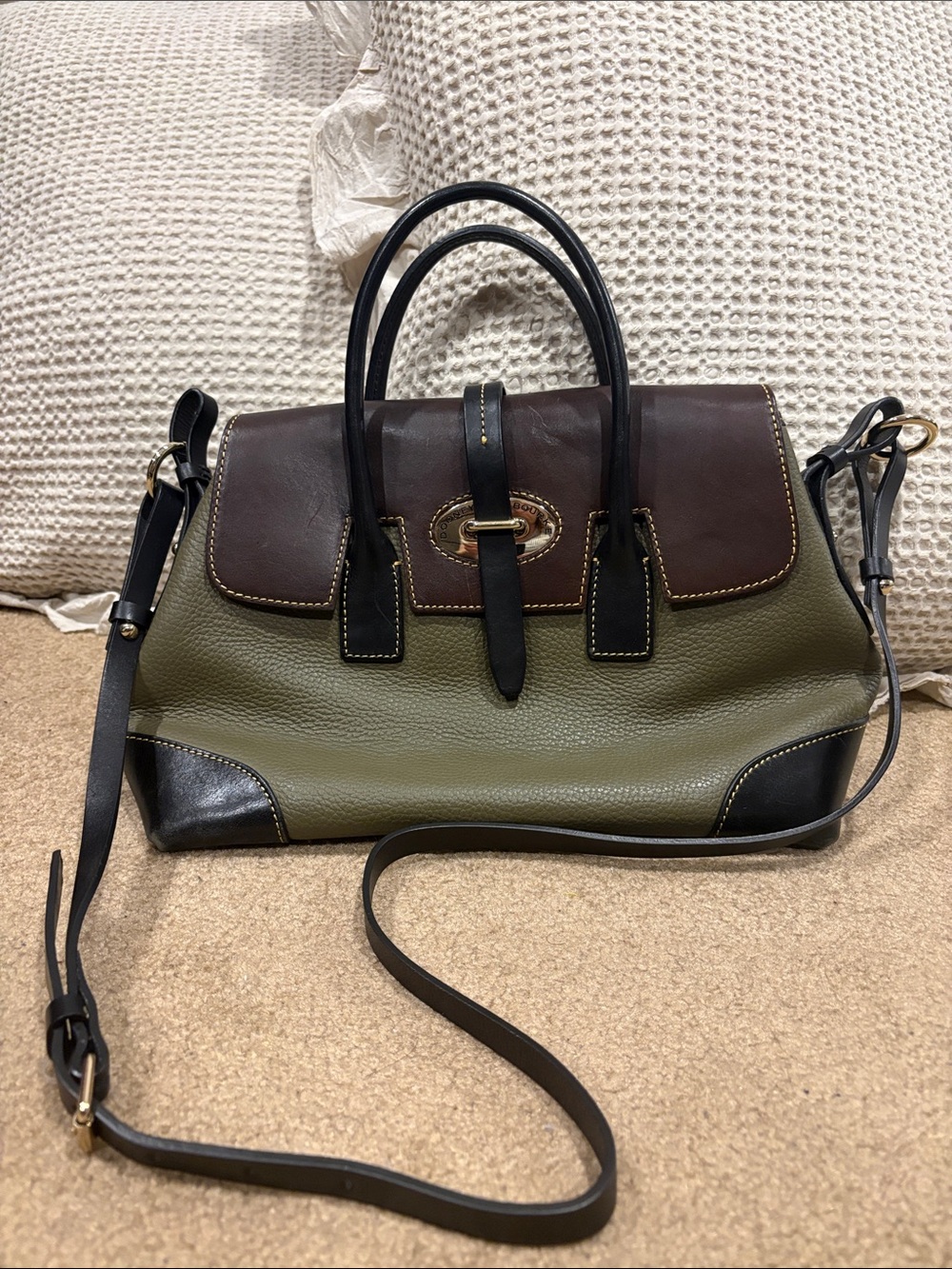 Dooney & Bourke multicolored handbag with shoulder strap.